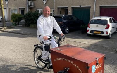 Stukadoor op de elektrische bakfiets